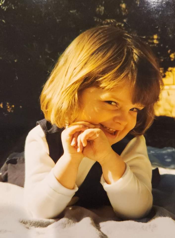 Young Lucy with early curiosity for technology