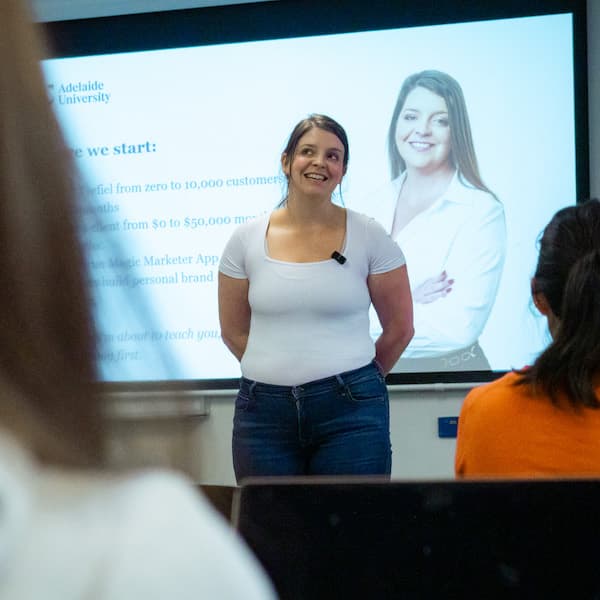 Lucy Bloomfield speaking on stage